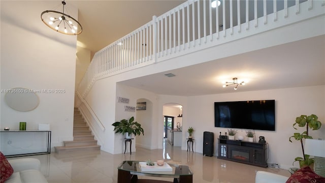 living room featuring a high ceiling