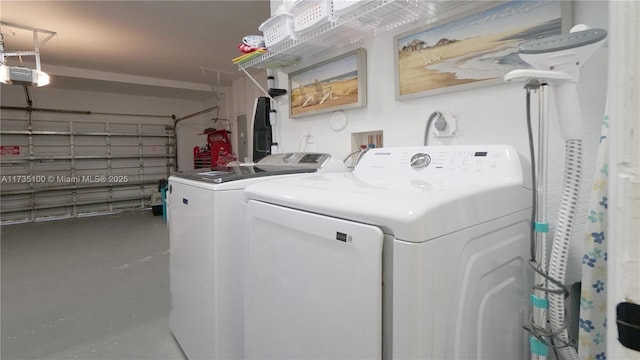 clothes washing area featuring washing machine and dryer