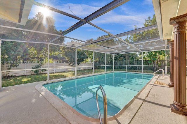 view of pool featuring a lanai and a patio