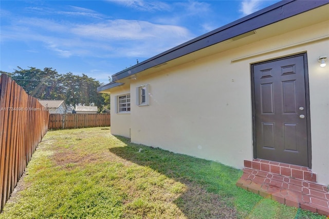 exterior space featuring a lawn