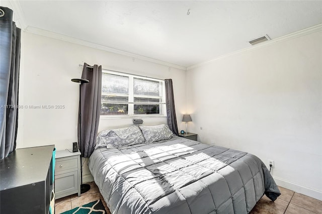 tiled bedroom with ornamental molding