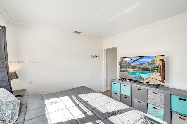 bedroom featuring crown molding