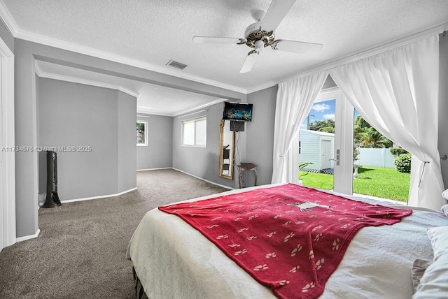 bedroom with carpet flooring, ornamental molding, access to exterior, ceiling fan, and a textured ceiling