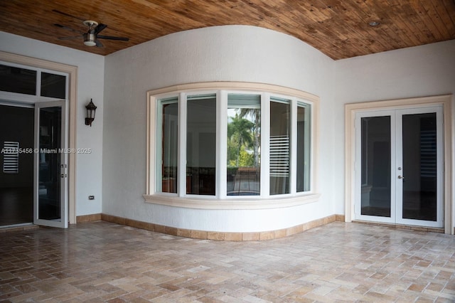 view of patio / terrace featuring french doors and ceiling fan