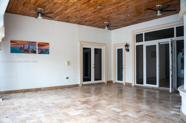 view of patio / terrace with ceiling fan and french doors