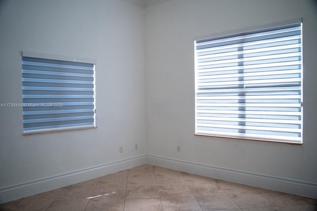 view of tiled empty room