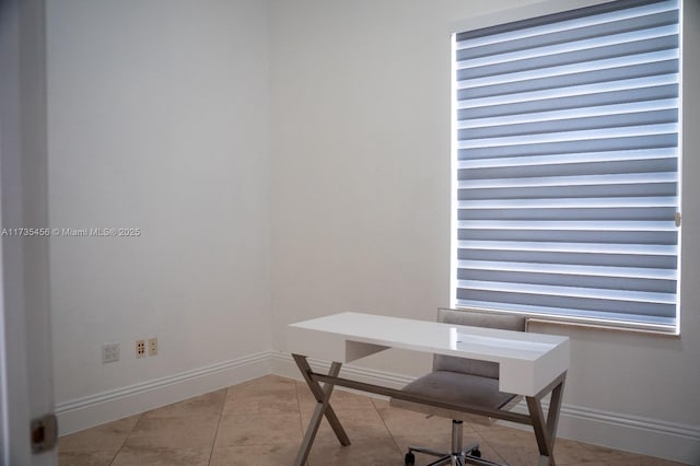 home office with light tile patterned flooring