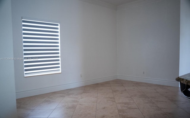 unfurnished room featuring ornamental molding