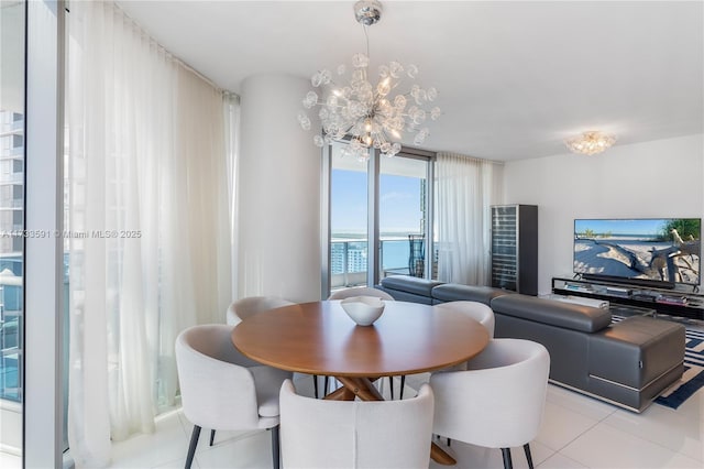 tiled dining area with floor to ceiling windows and a chandelier