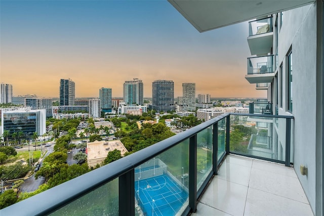 view of balcony at dusk