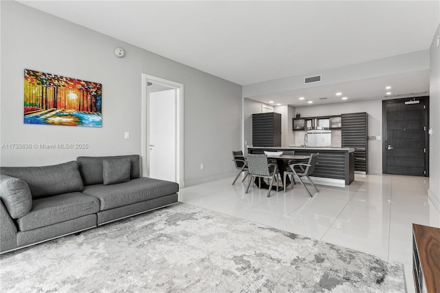 tiled living room with sink