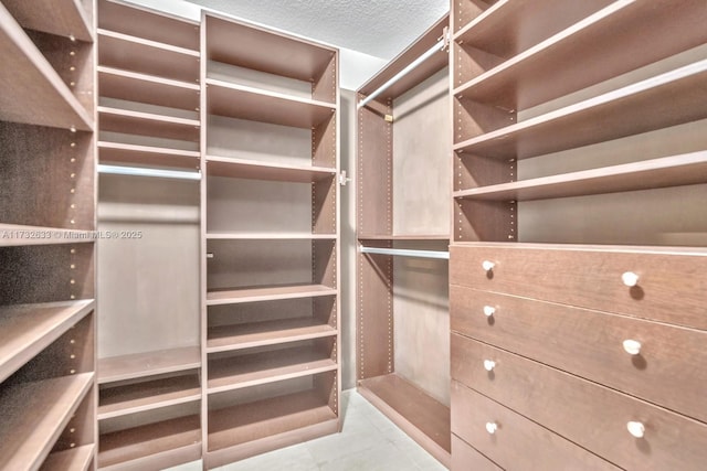 walk in closet featuring tile patterned floors