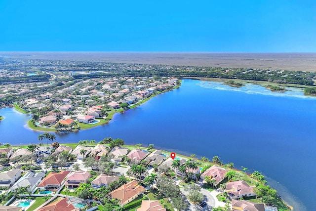 bird's eye view with a water view