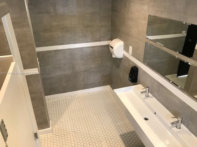 bathroom featuring tile walls and tile patterned floors