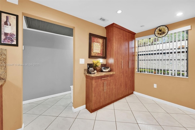 interior space featuring light tile patterned floors