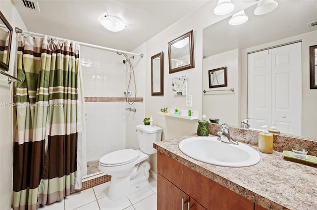 bathroom featuring walk in shower, vanity, toilet, and tile patterned flooring