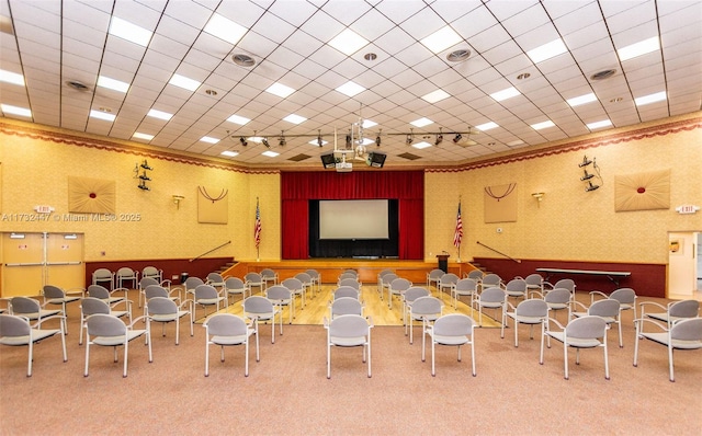 home theater room featuring carpet flooring