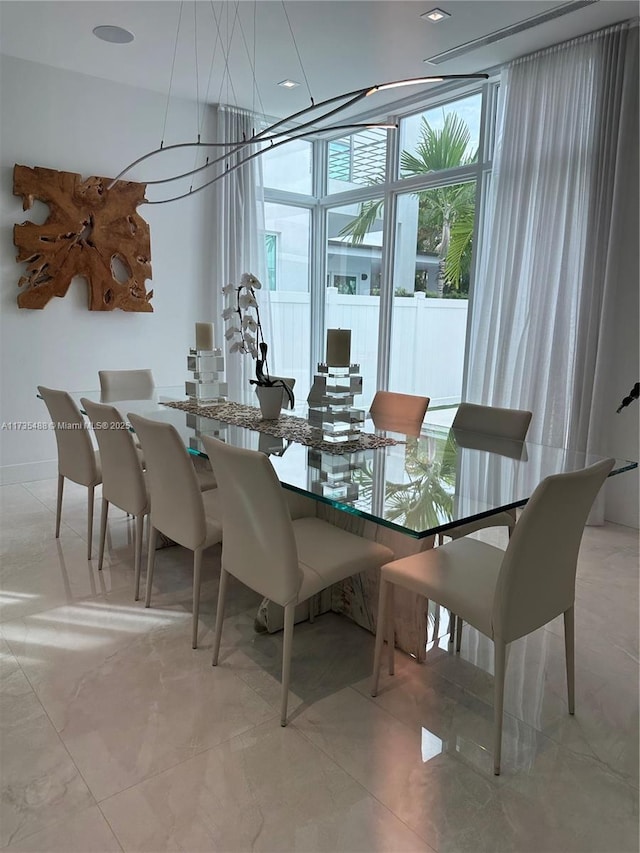 dining room with expansive windows