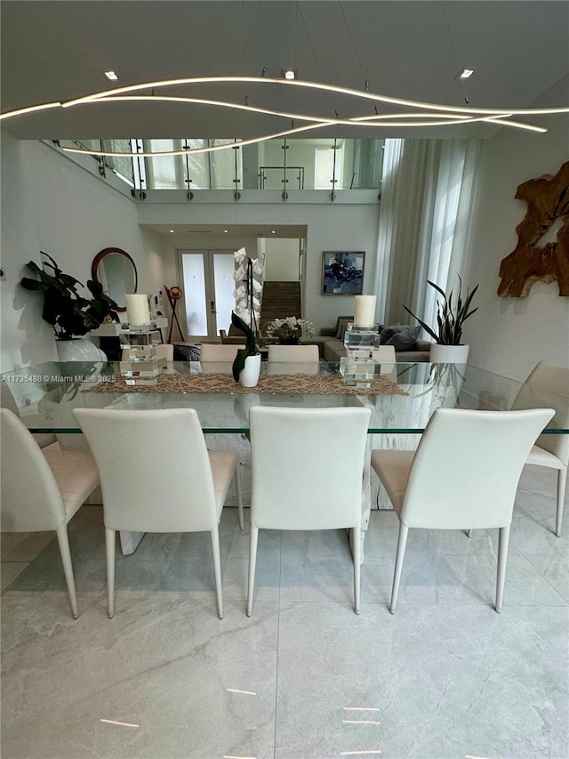 dining space featuring french doors