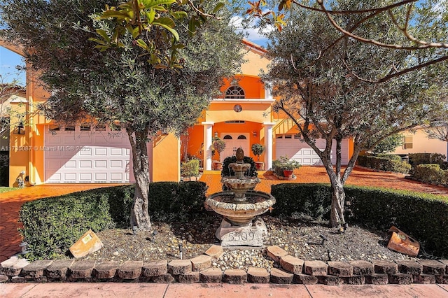 view of front of house with a garage