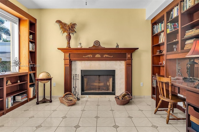 interior space featuring a high end fireplace