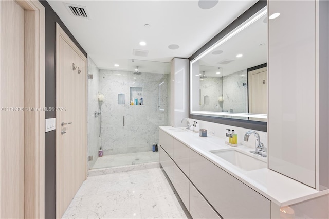 bathroom with vanity and walk in shower