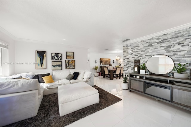 tiled living room featuring ornamental molding and a textured ceiling