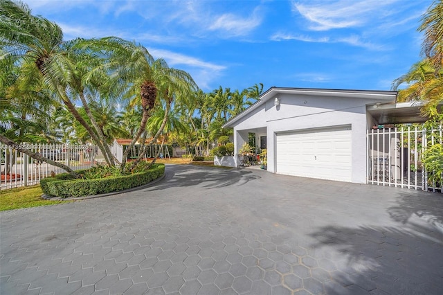 view of property exterior with a garage