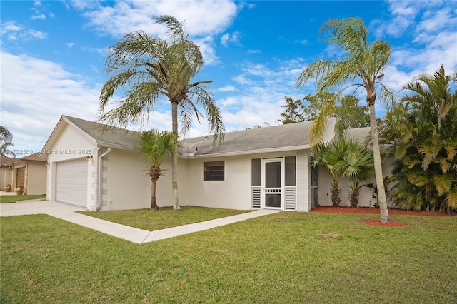 single story home with a garage and a front yard