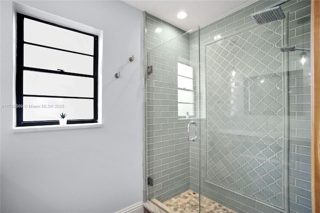 bathroom featuring an enclosed shower