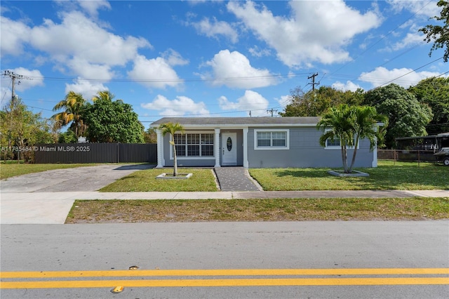 view of front of property with a front lawn