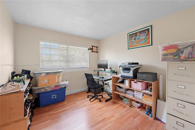 office area with light wood-type flooring