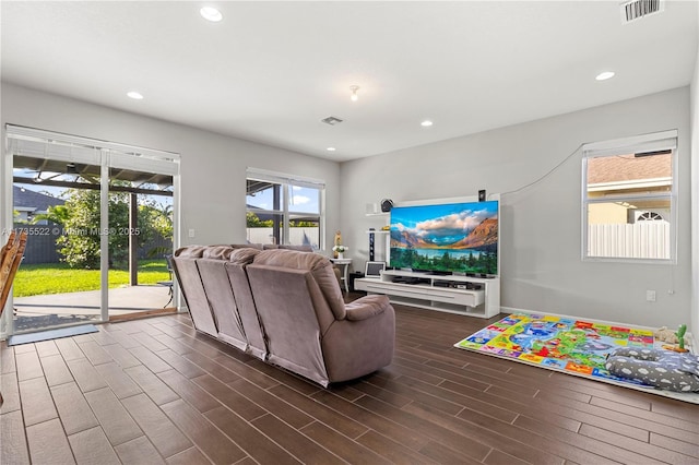 living room featuring dark hardwood / wood-style floors