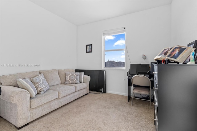 living room featuring light carpet