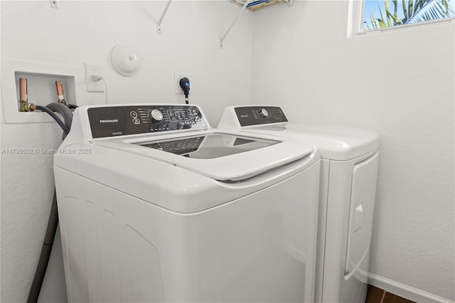 washroom featuring independent washer and dryer