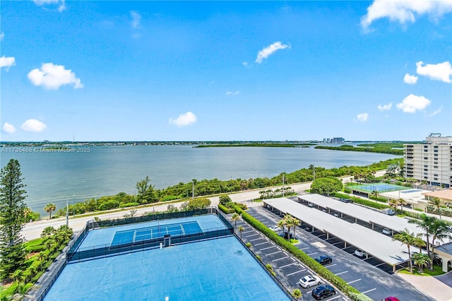 birds eye view of property featuring a water view