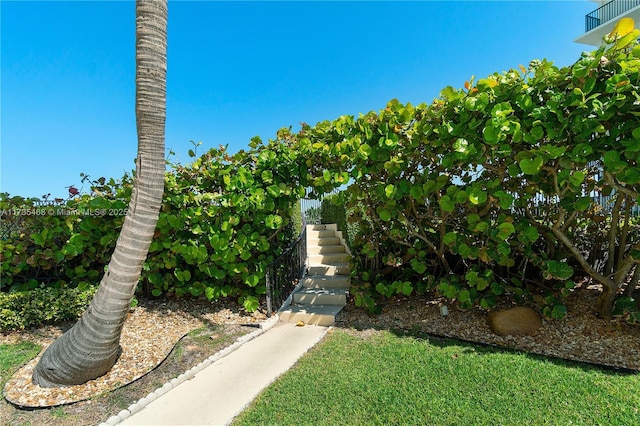 view of property's community featuring stairway