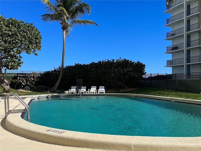 community pool with fence