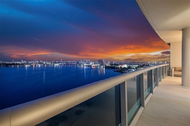 balcony at dusk with a water view