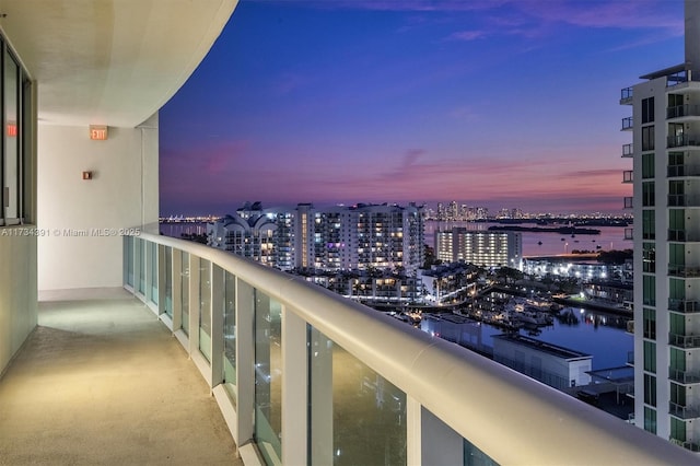 balcony with a city view and a water view