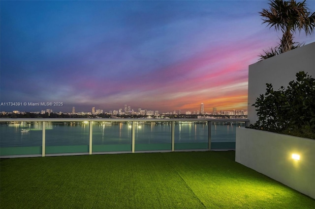 view of water feature with a city view