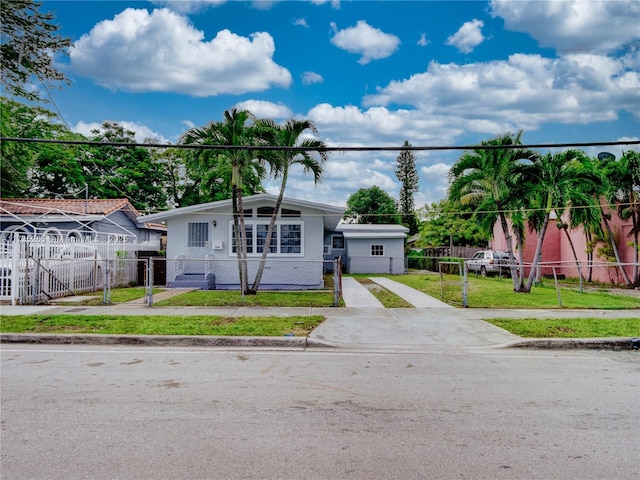 view of front facade with a front yard