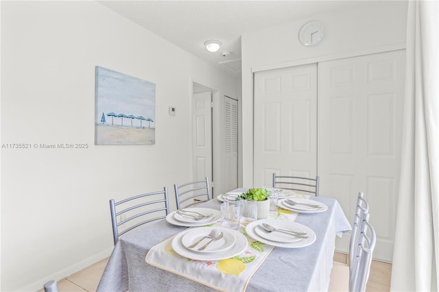 dining room with light tile patterned floors