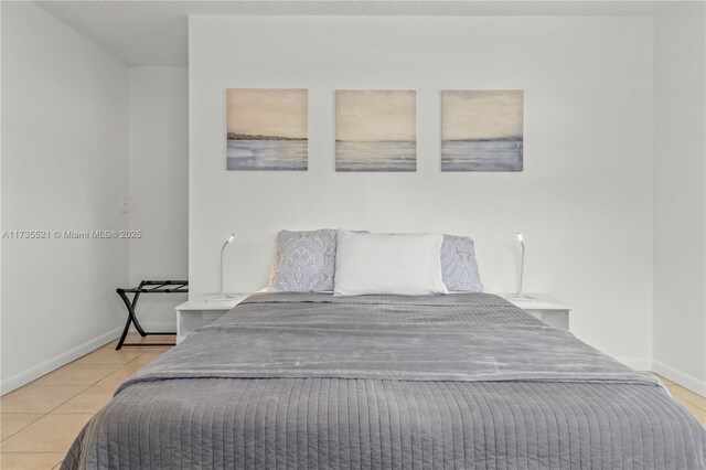 bedroom with tile patterned floors