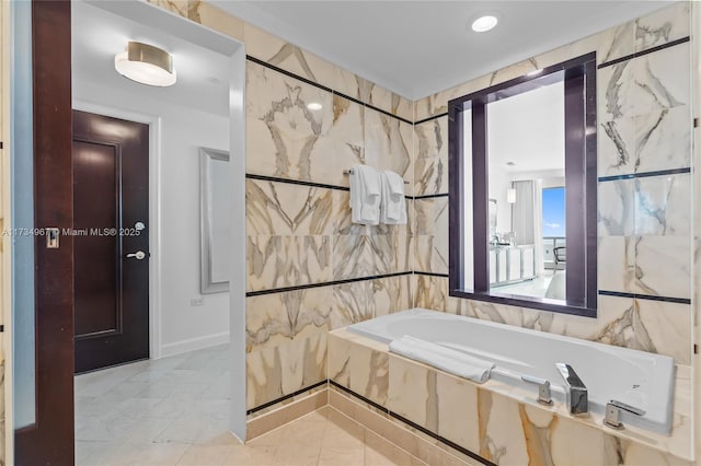 bathroom featuring separate shower and tub and tile walls