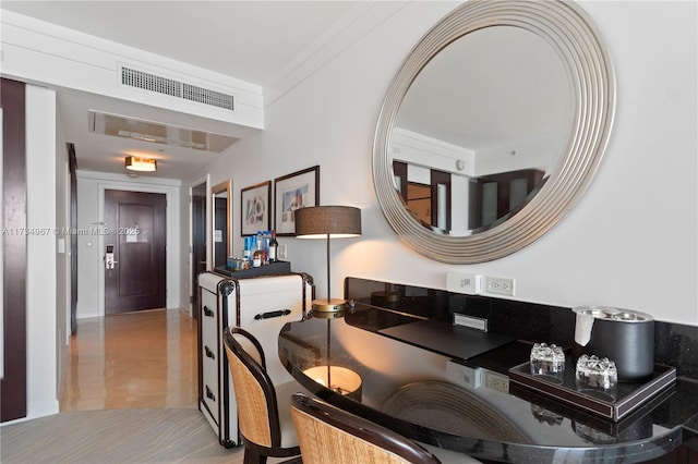 dining room featuring ornamental molding