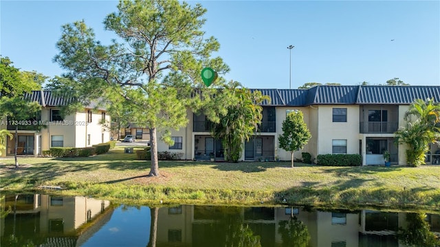 exterior space with a water view