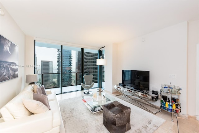 living room featuring floor to ceiling windows