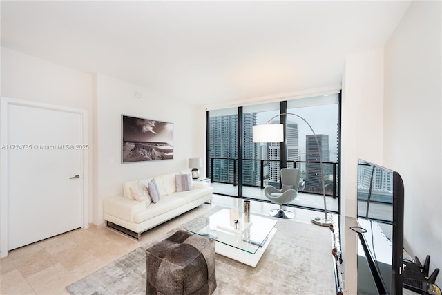 living room with floor to ceiling windows