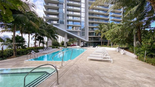 view of swimming pool featuring a patio